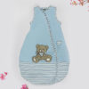 teddy-bear-on-blue-baby-bed-featured