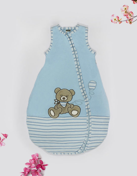teddy-bear-on-blue-baby-bed-featured